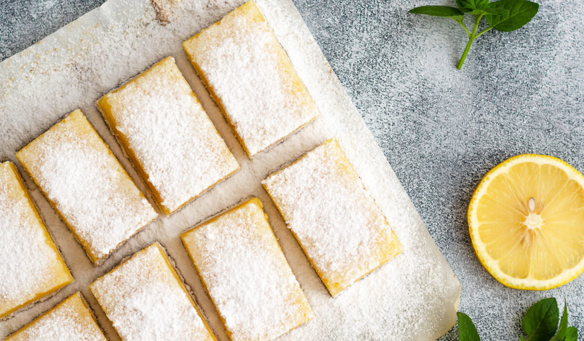 Lemon,Squares,On,Baking,Paper,,A,Slice,Of,Lemon,And