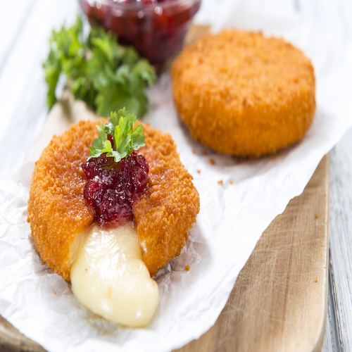 Fried Camembert (selective focus) with Cranberry sauce