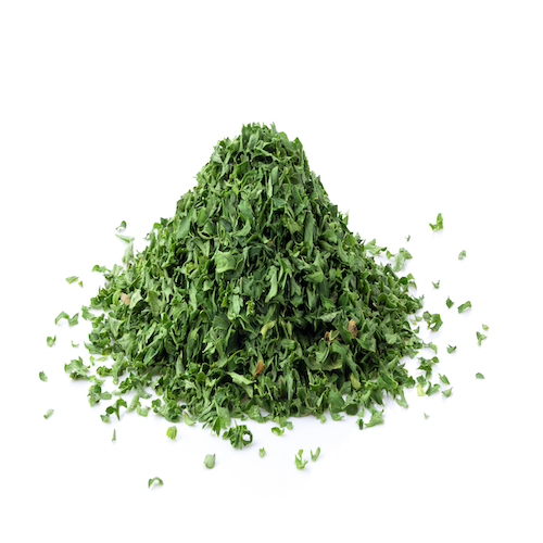 dried parsley isolated on white background full depth of field