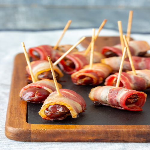 Dates wrapped with bacon